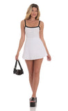 Black Trim A line Romper in White