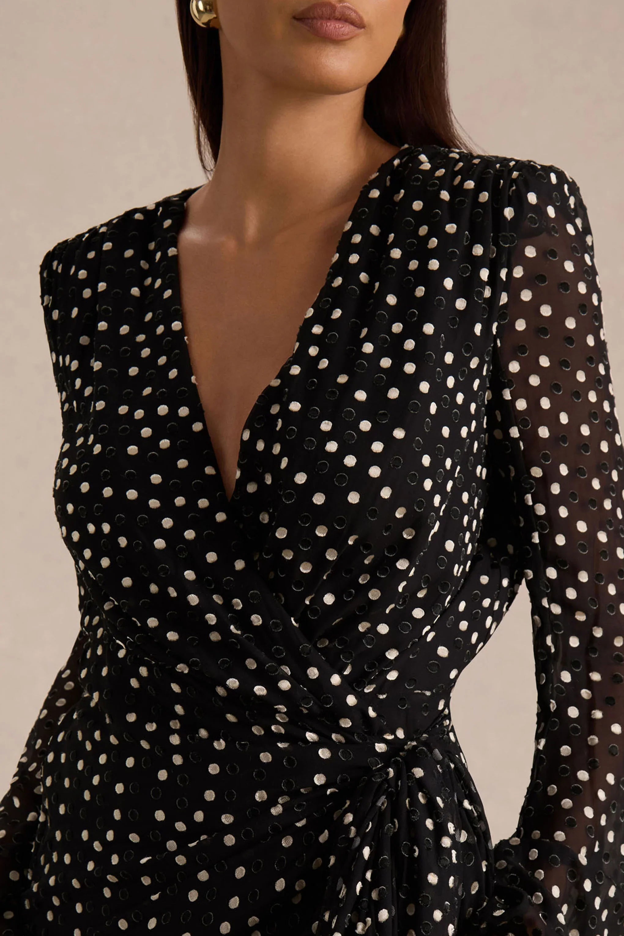 Mela Black And White Polka Dot Plunge Neck Mini Dress With Bell Sleeves And Sash Detail