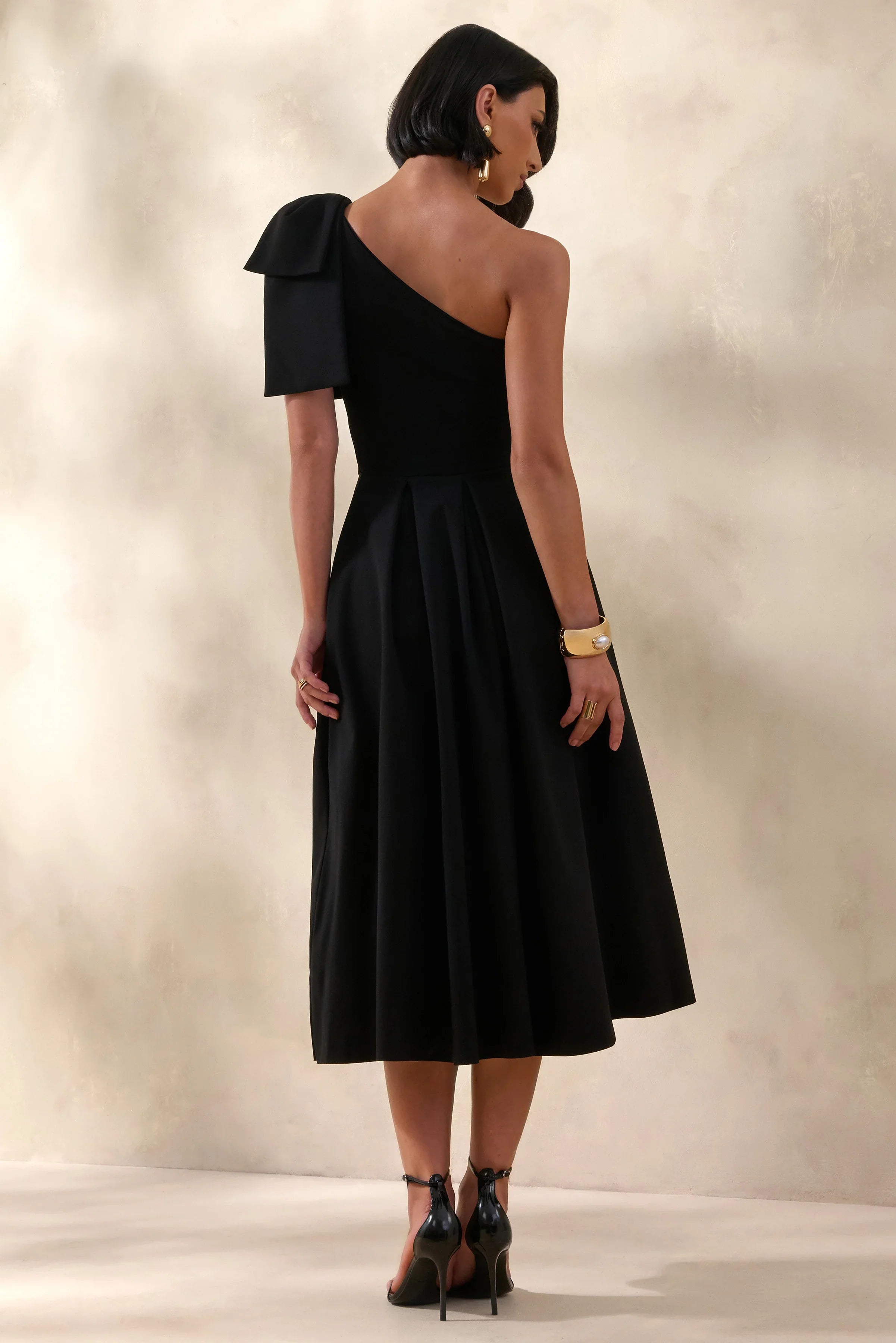 Meria Black Asymmetric Neck Midi Dress With Bow Sleeve