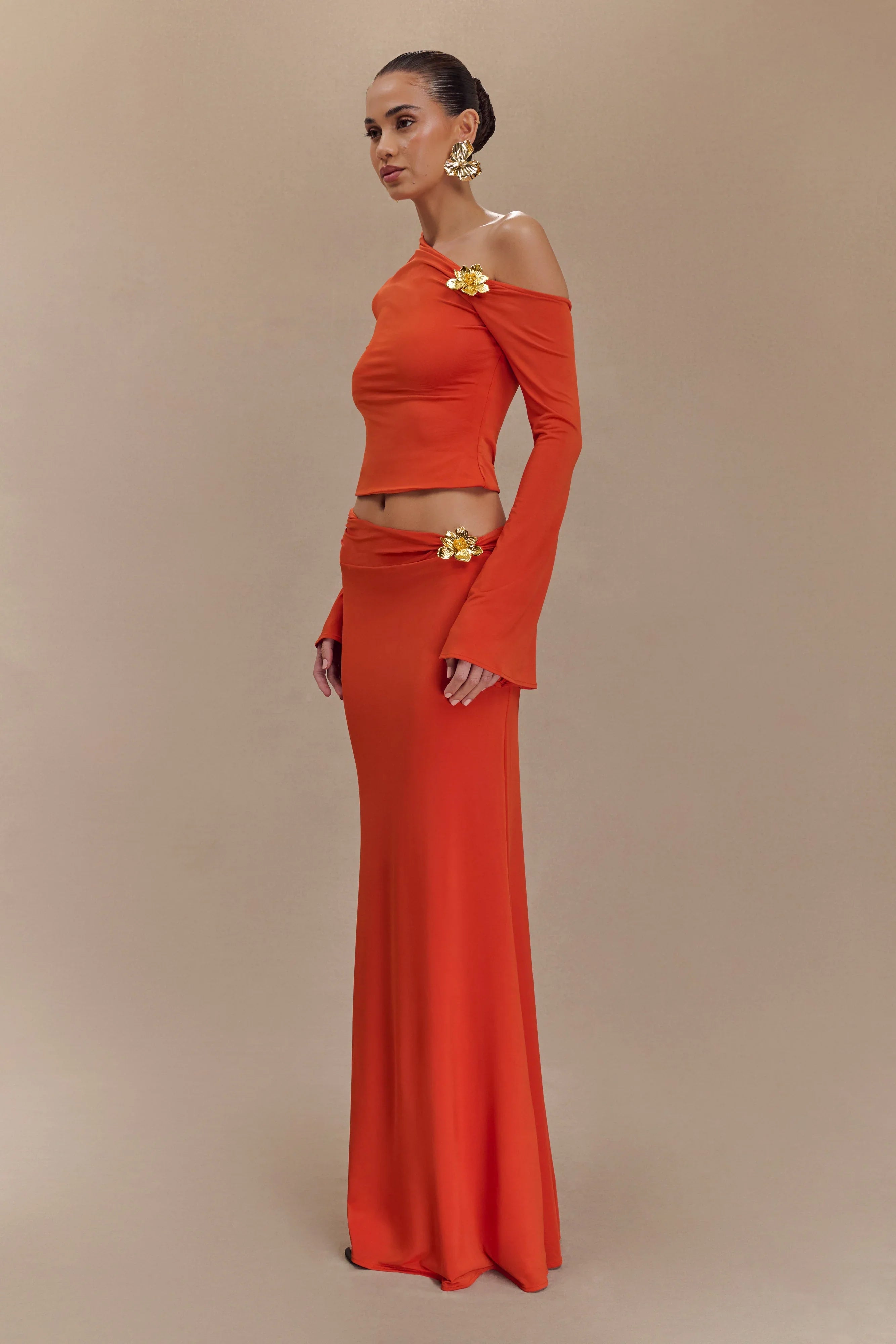 Ainsley Asymmetrical Maxi Skirt With Floral Hardware Burnt Orange