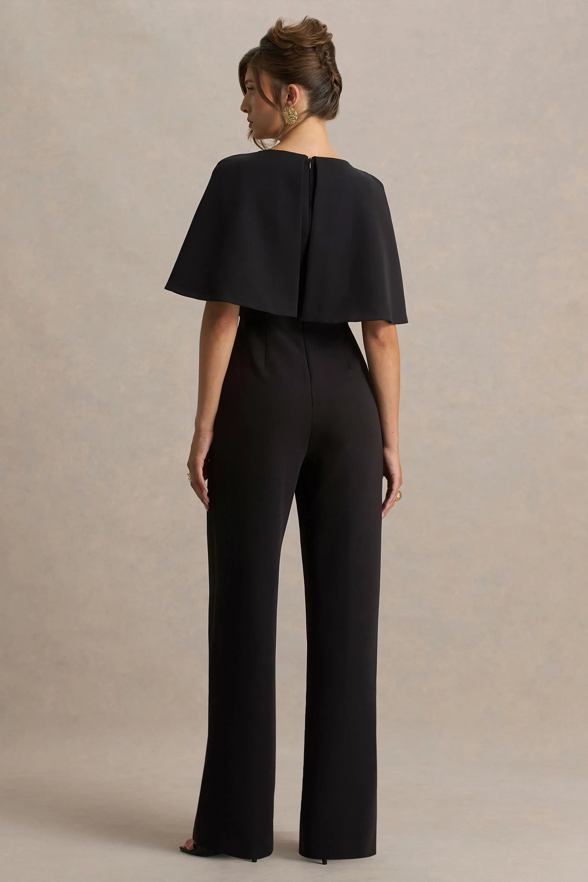 Vivid Black Plunge Neck Jumpsuit With Bow Detail