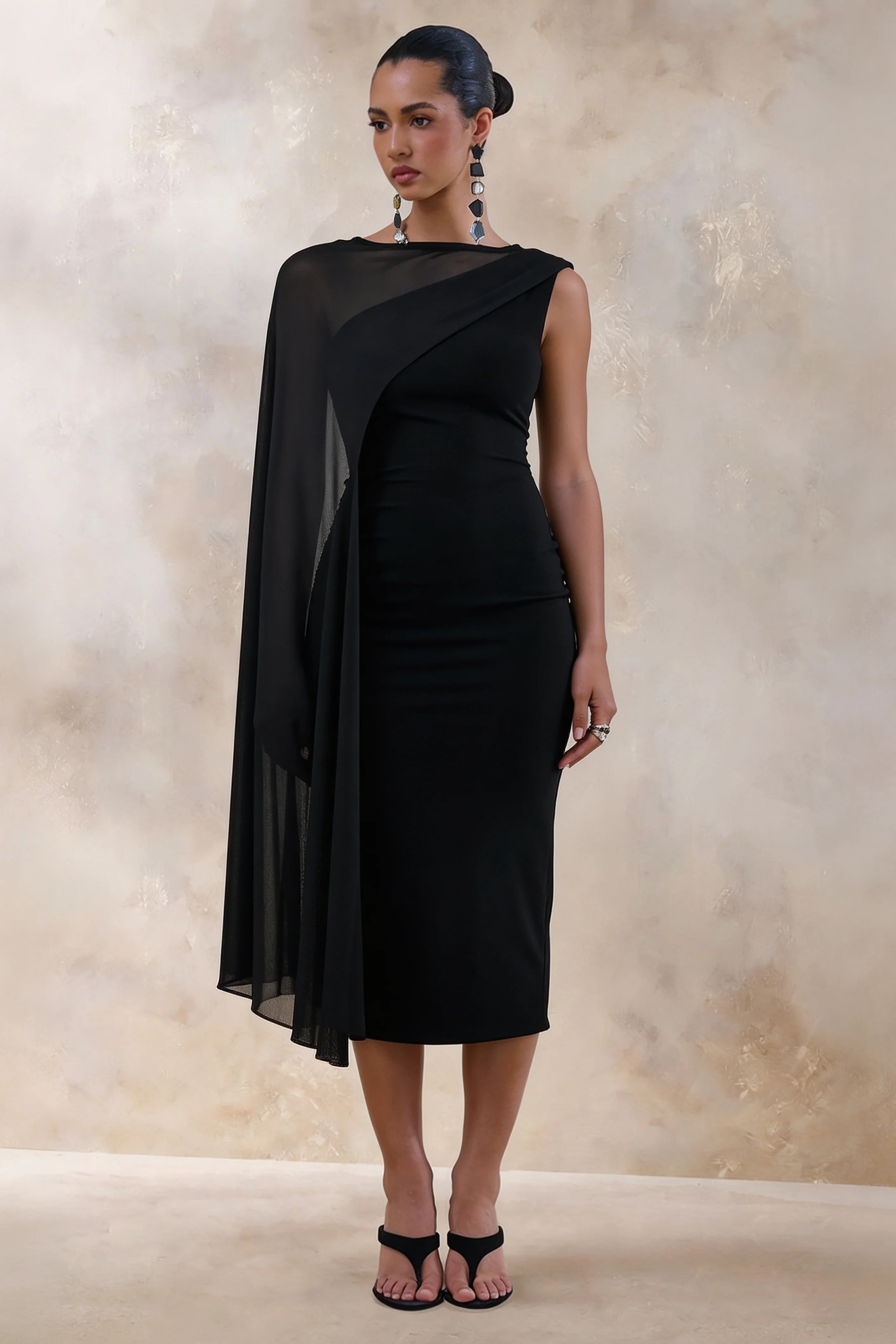 Caloria Black Asymmetric Neck Midi Dress With Mesh Cape