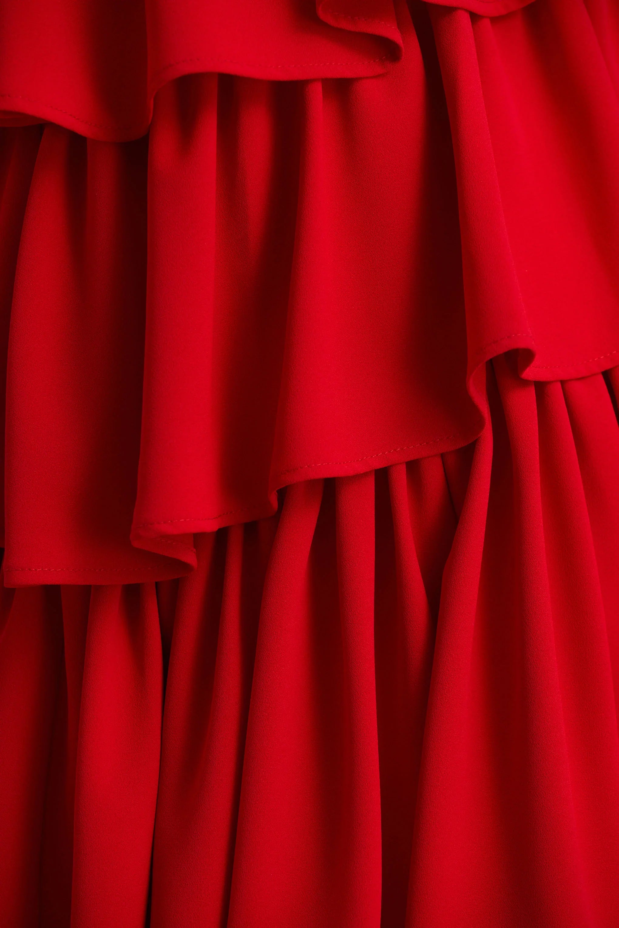 Bogota Red Plunge Neck Maxi Dress With Ruffling Details And Front High Split