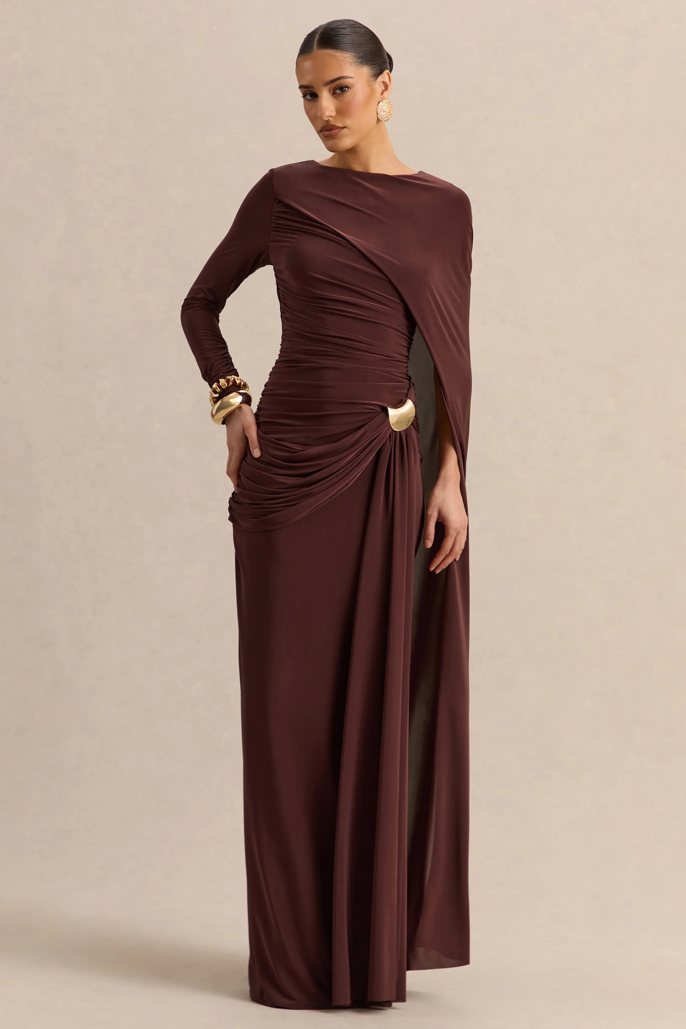 Orintha Brown Slashed Neck Maxi Dress With Cape And Gold Detail
