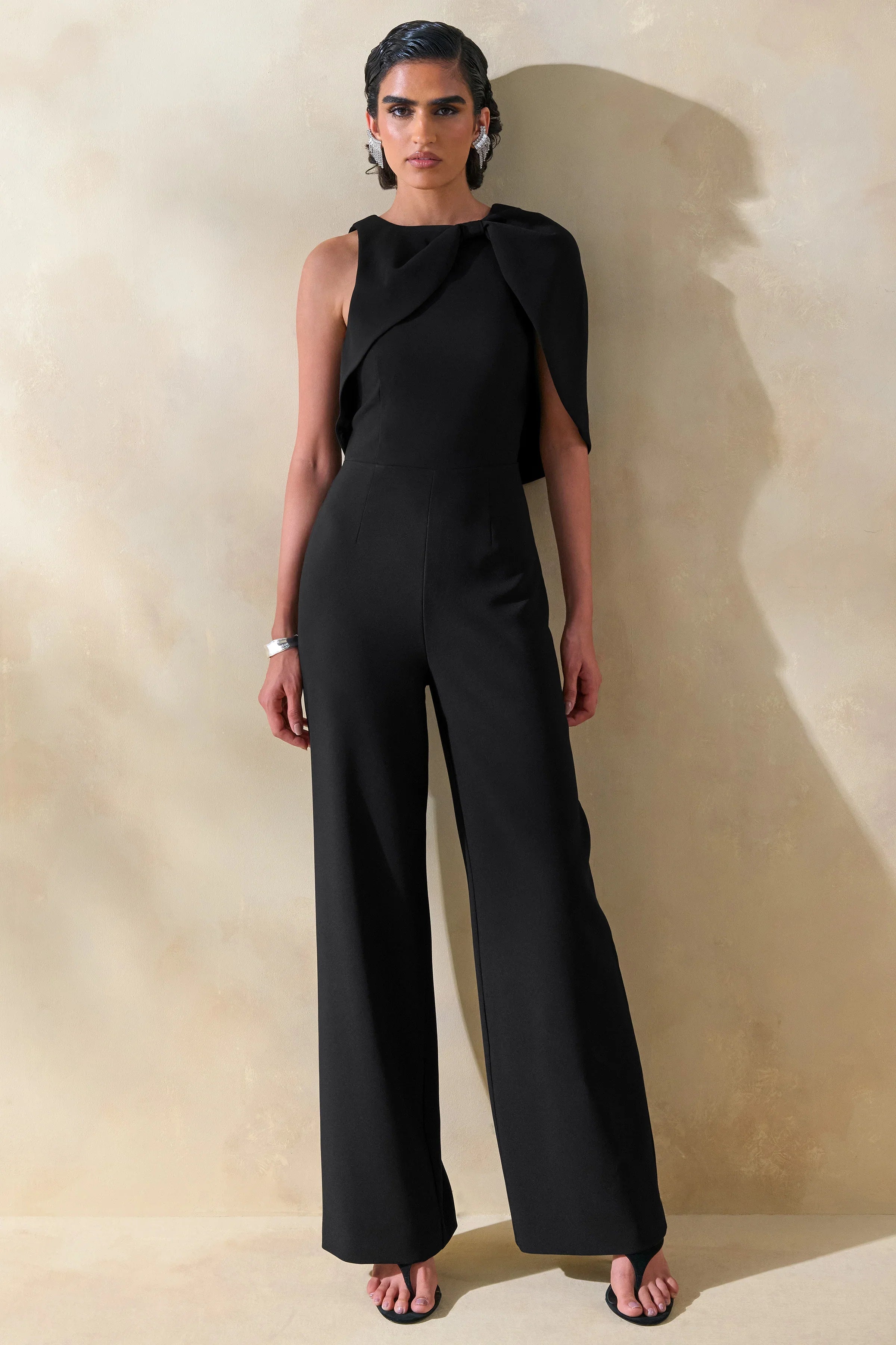 Quinley Black Asymmetric Neck Jumpsuit With Cape Sleeve