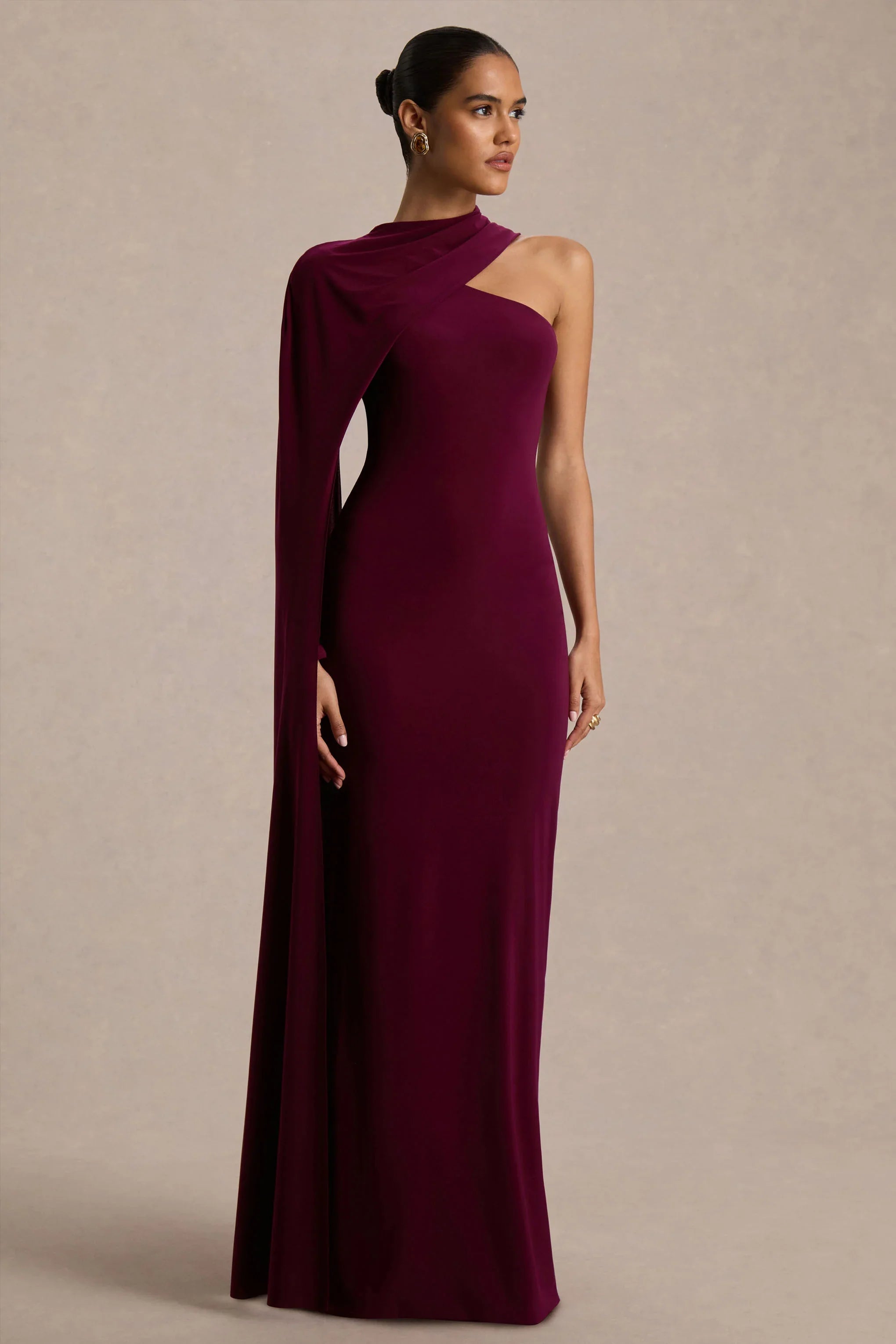 Dawn Burgundy Asymmetric Neck Maxi Dress With One Long Sleeve And Cape