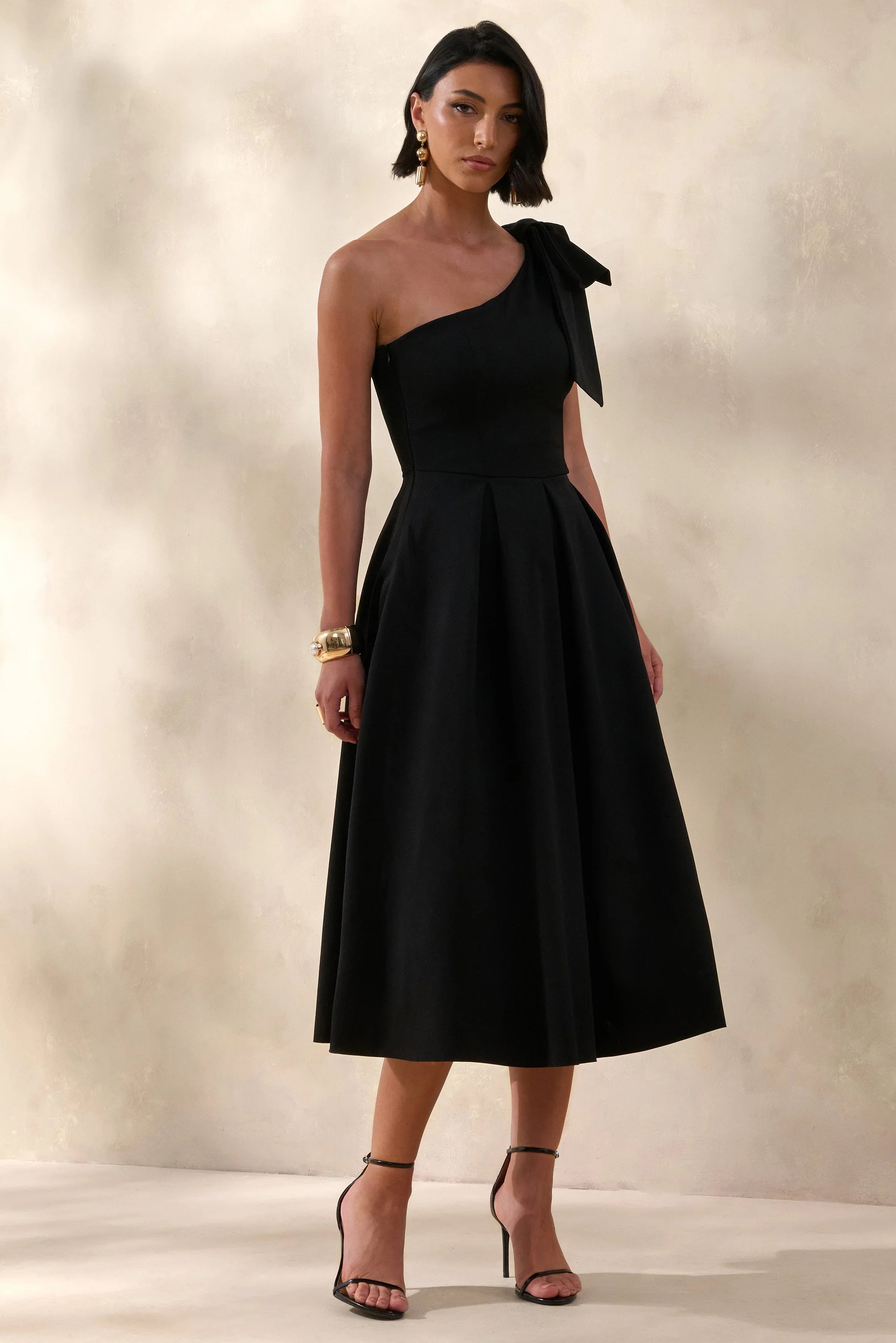 Meria Black Asymmetric Neck Midi Dress With Bow Sleeve