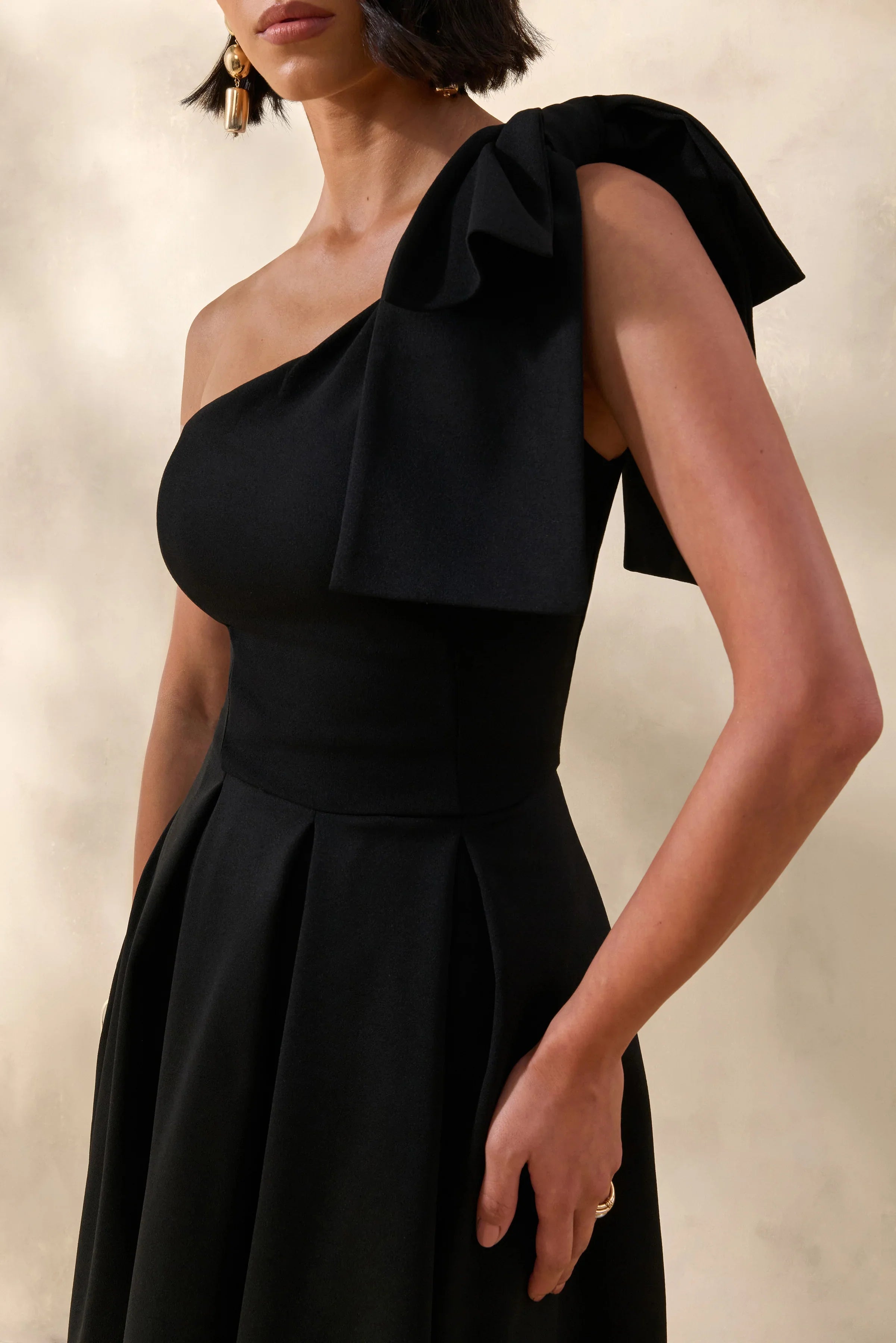 Meria Black Asymmetric Neck Midi Dress With Bow Sleeve