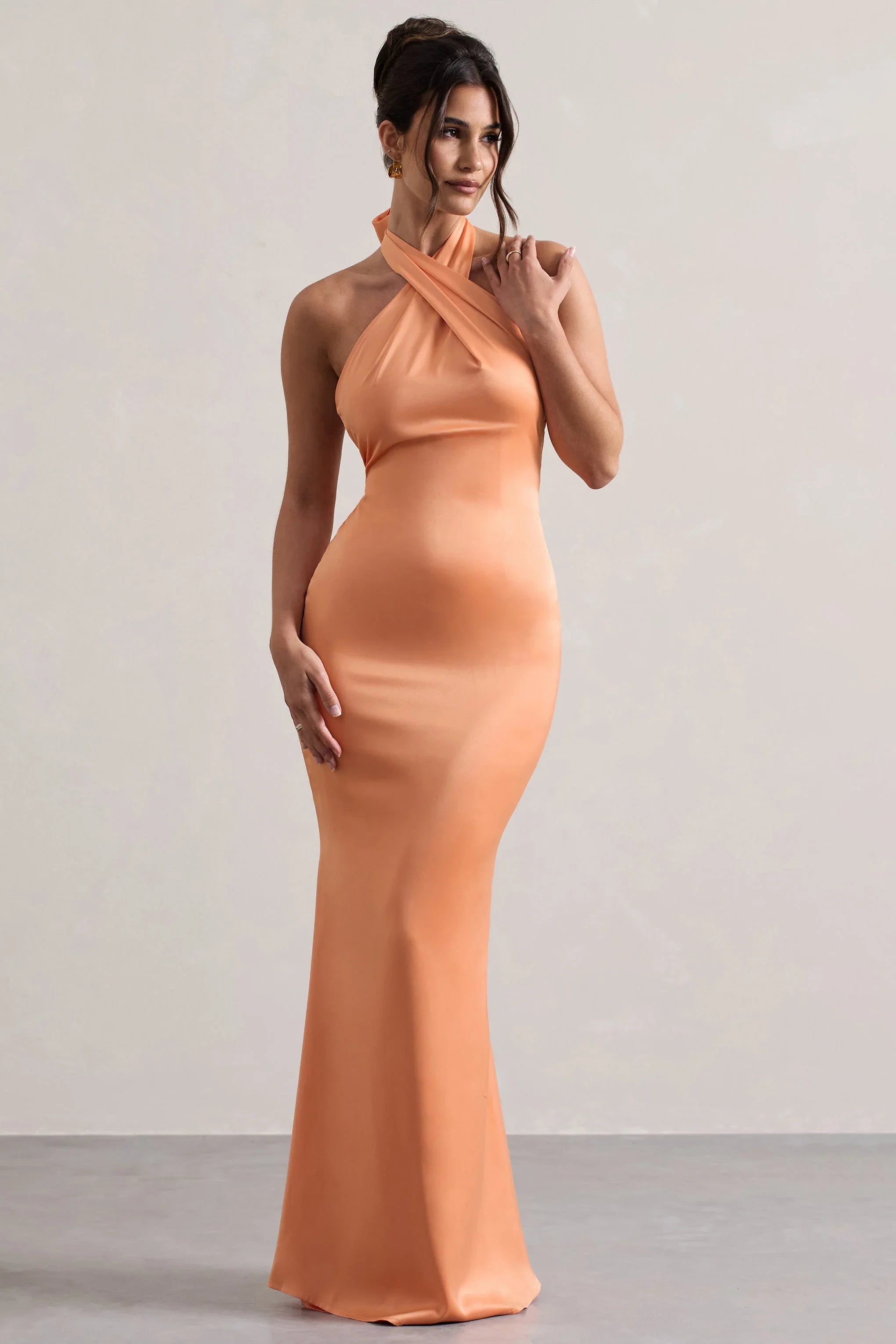 Unbeatable Peach Satin Cross Over Halter Neck Maxi Dress