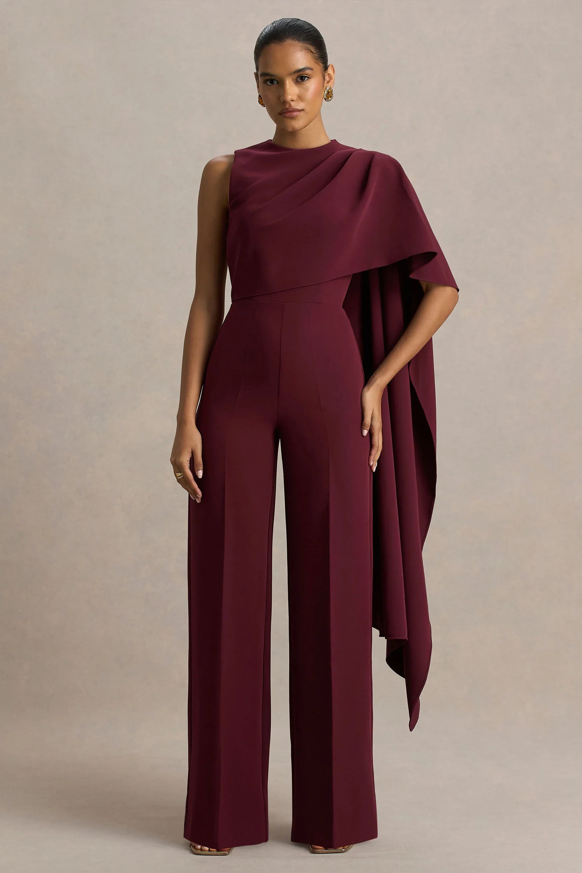 Sorenia Burgundy High Neck Jumpsuit With One Cape Sleeve
