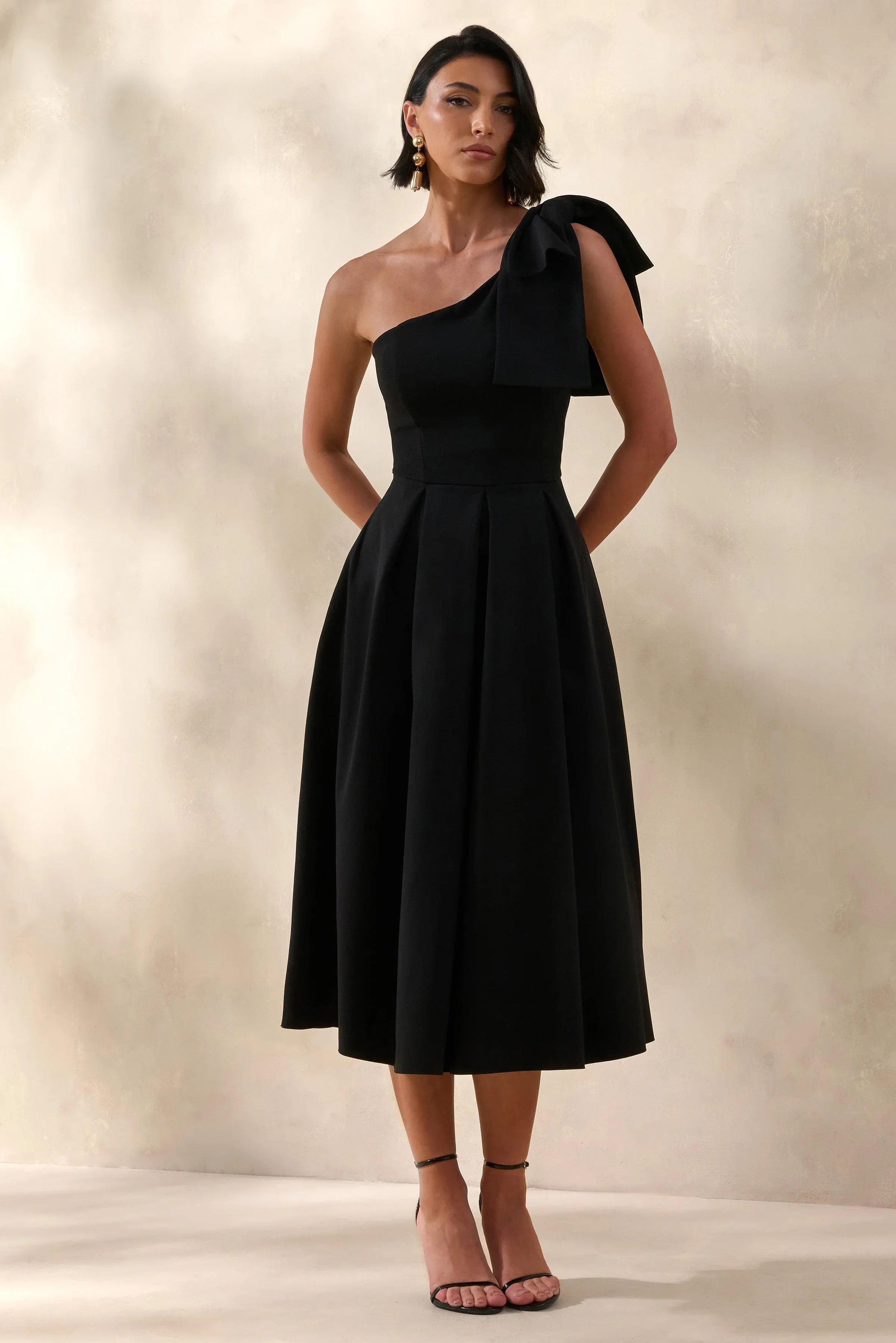 Meria Black Asymmetric Neck Midi Dress With Bow Sleeve