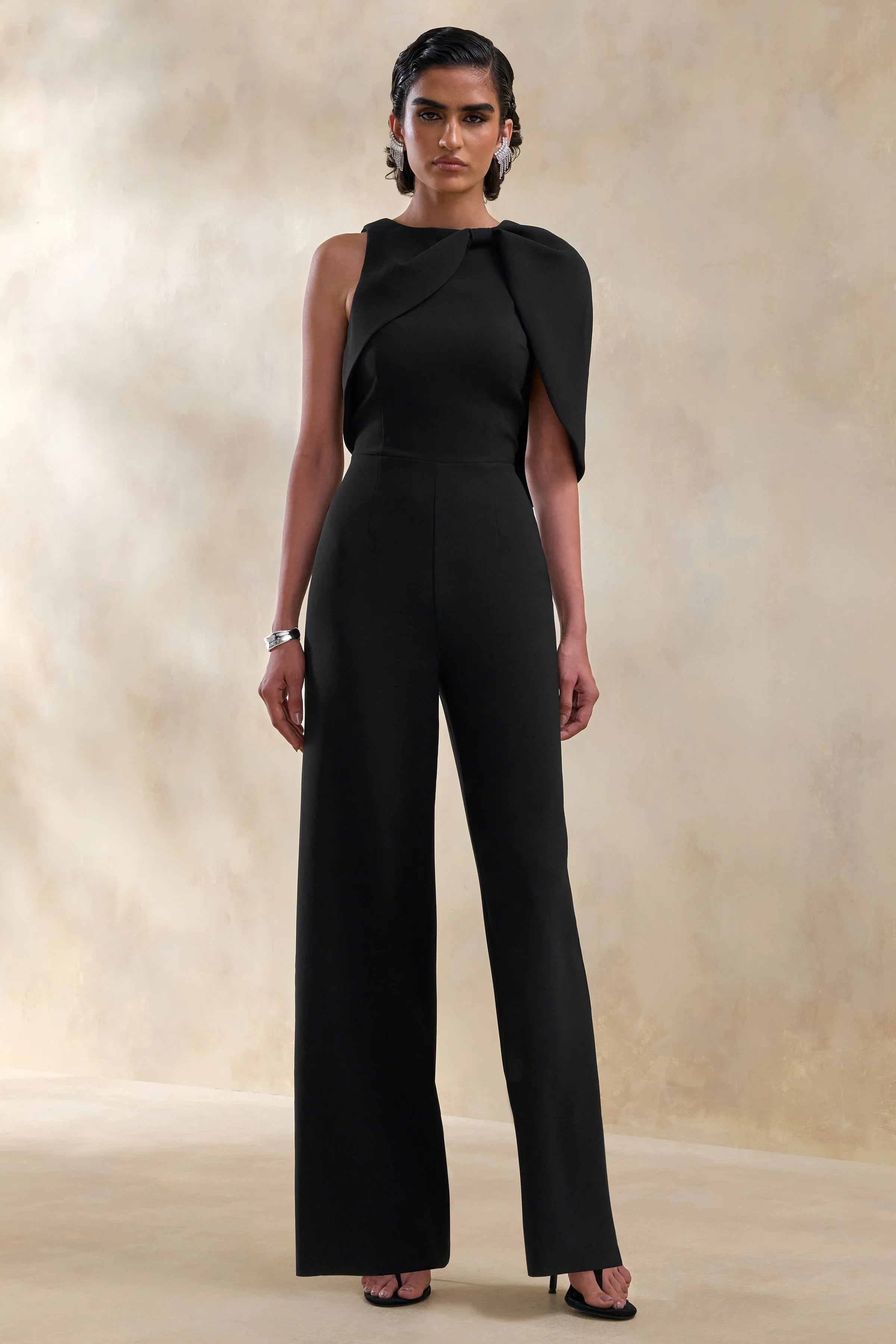 Quinley Black Asymmetric Neck Jumpsuit With Cape Sleeve